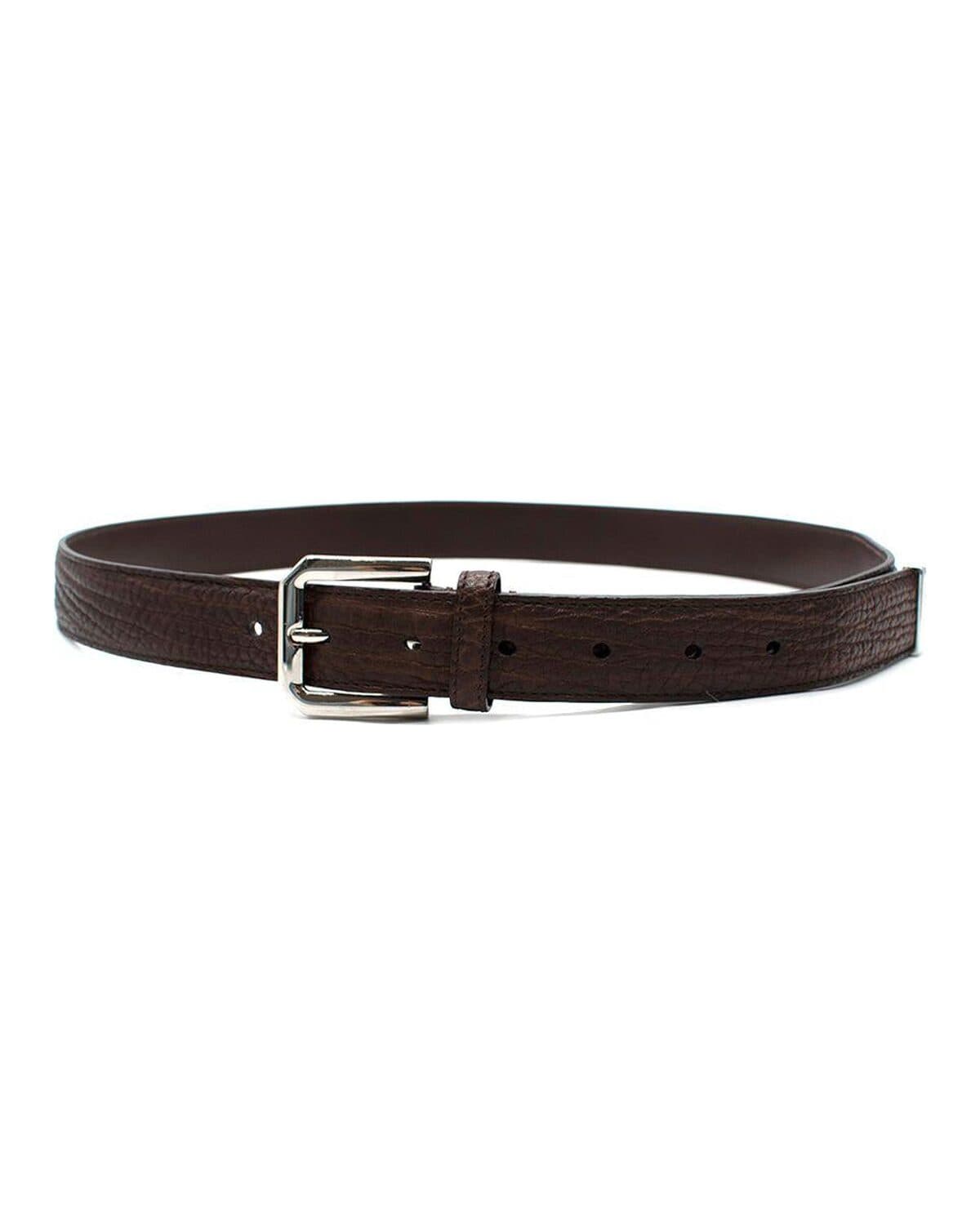 Embossed leather belt photographed on a neutral ground