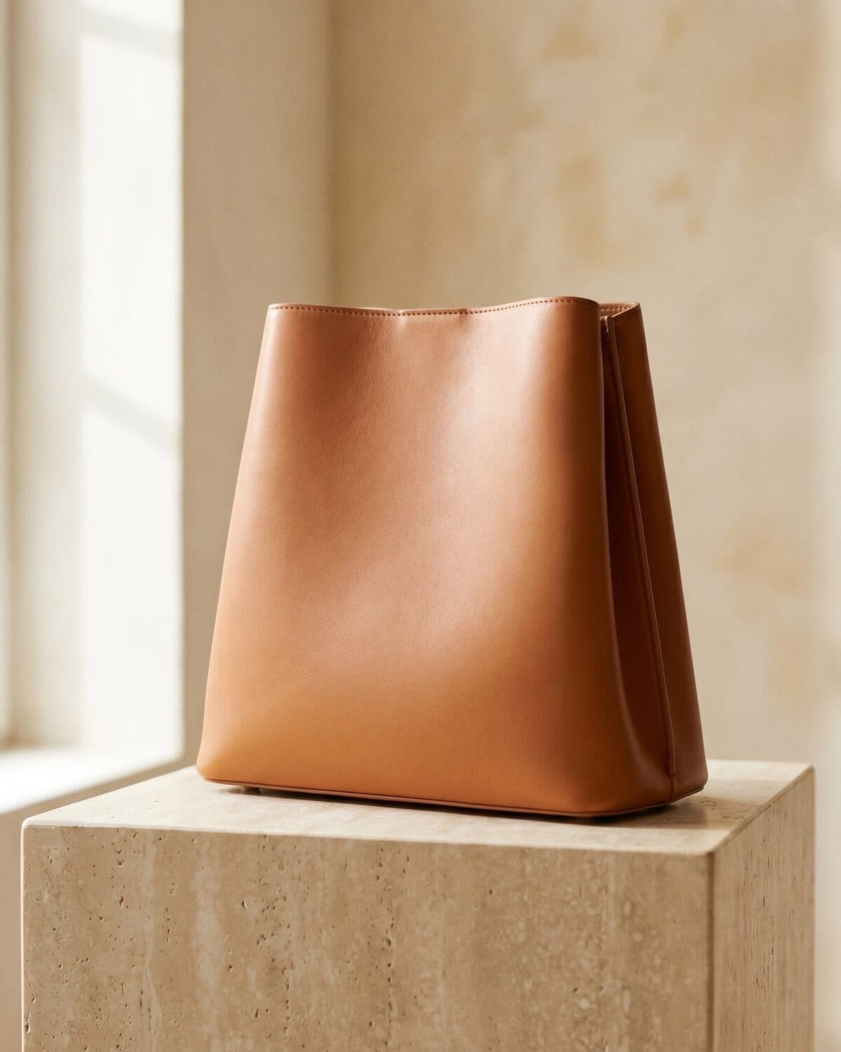 Structured quilted handbag still life in warm natural light