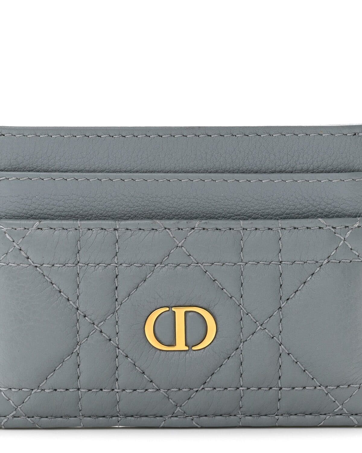 A Dior card holder in grey cannage leather with a gold CD clasp