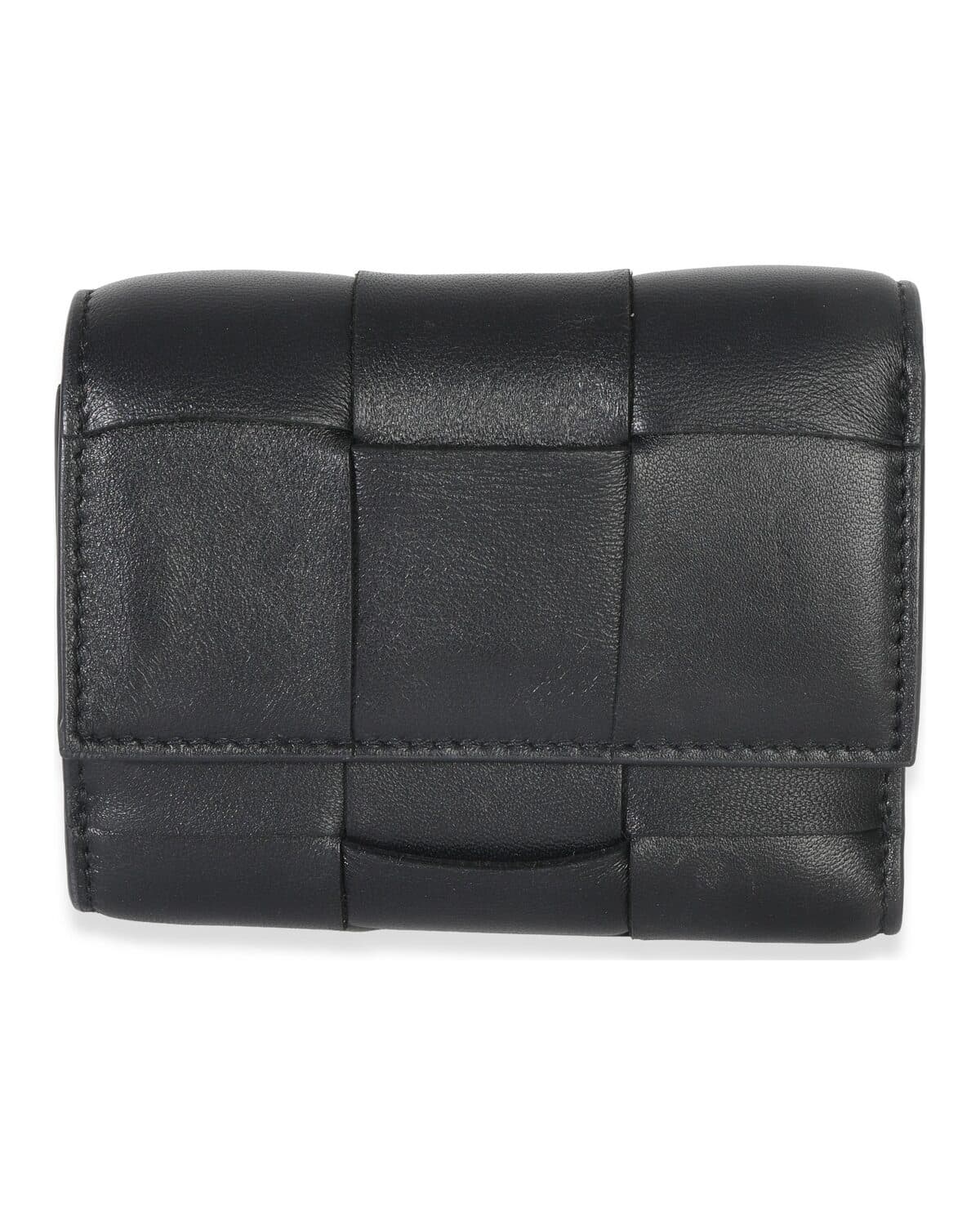 Woven leather trifold, black photographed on a neutral ground